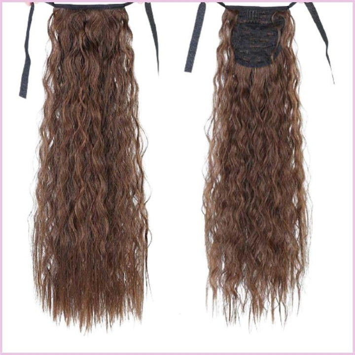 Postiche queue de cheval cheveux frisés chatain