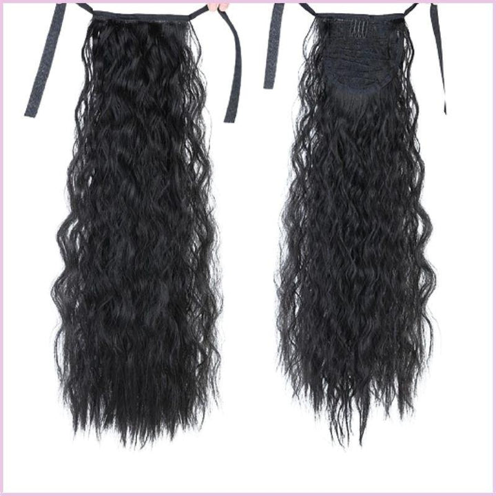 Postiche queue de cheval cheveux frisée  noire