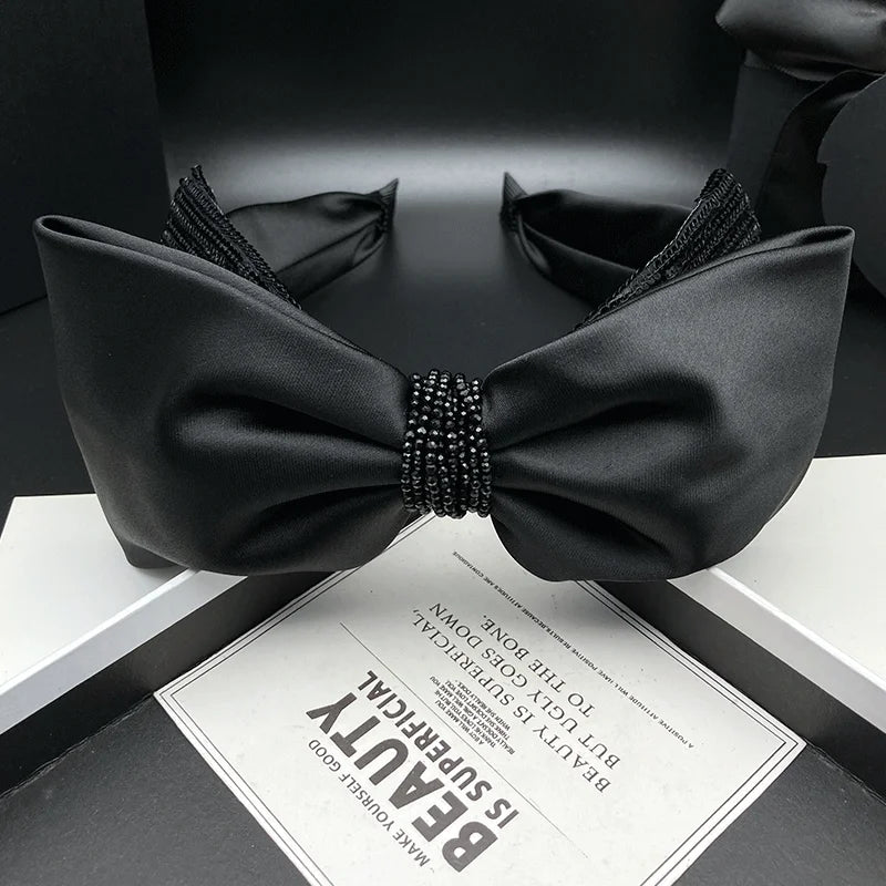 Serre-tête nœud satin noir élégant femme accessoire cheveux chic