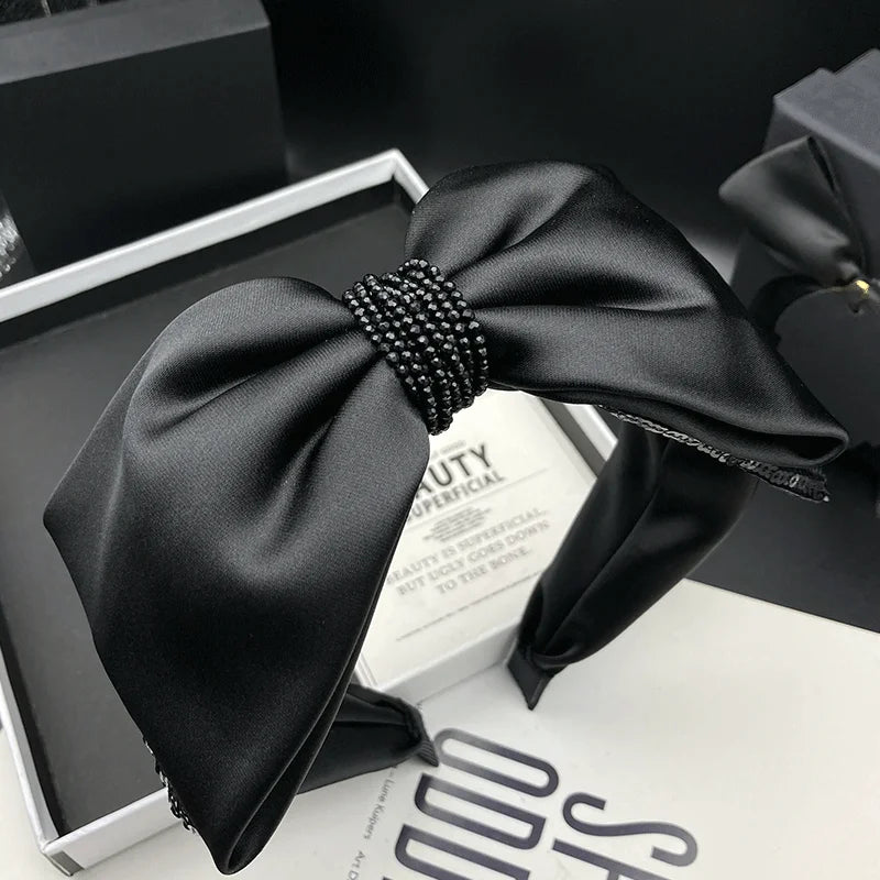 Serre-tête nœud satin noir élégant femme accessoire cheveux chic