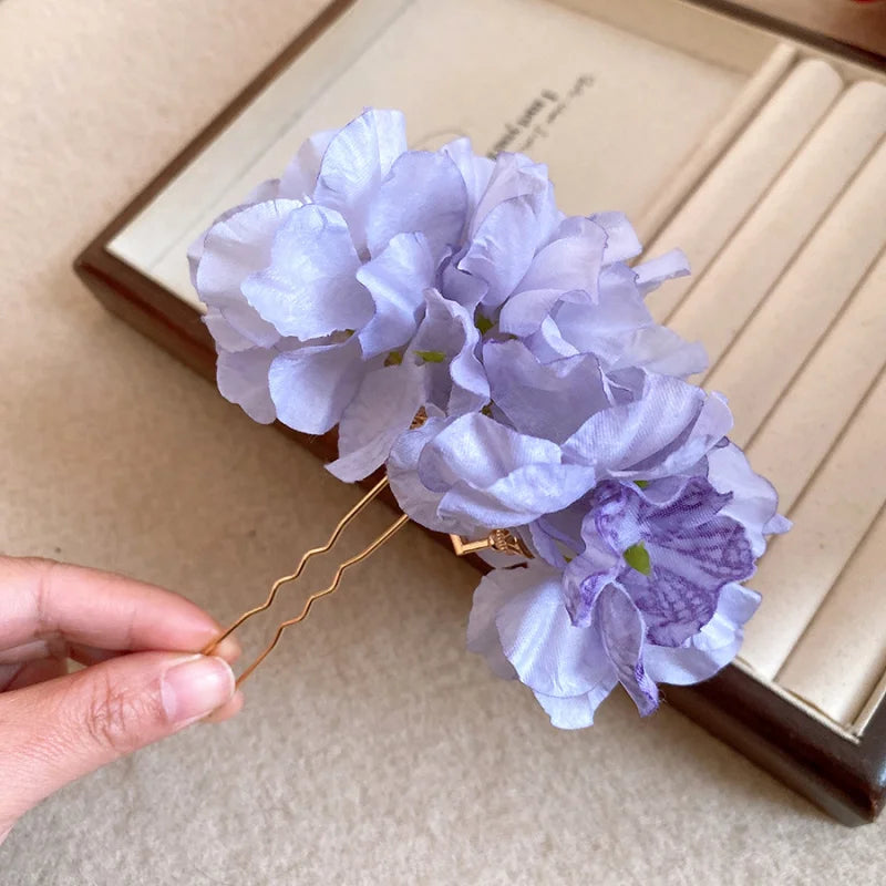 Épingle à cheveux fleurs violet bohème